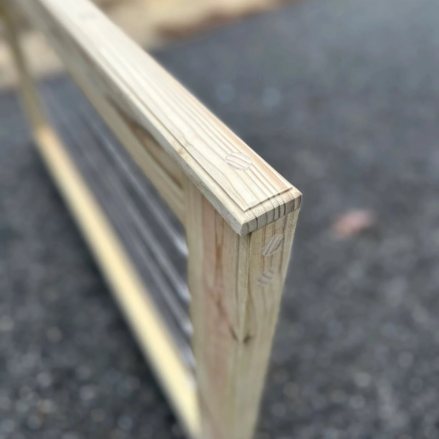Side and corner view of a modern cable wire patio gate, designed for durability and safety on outdoor decks and patios.