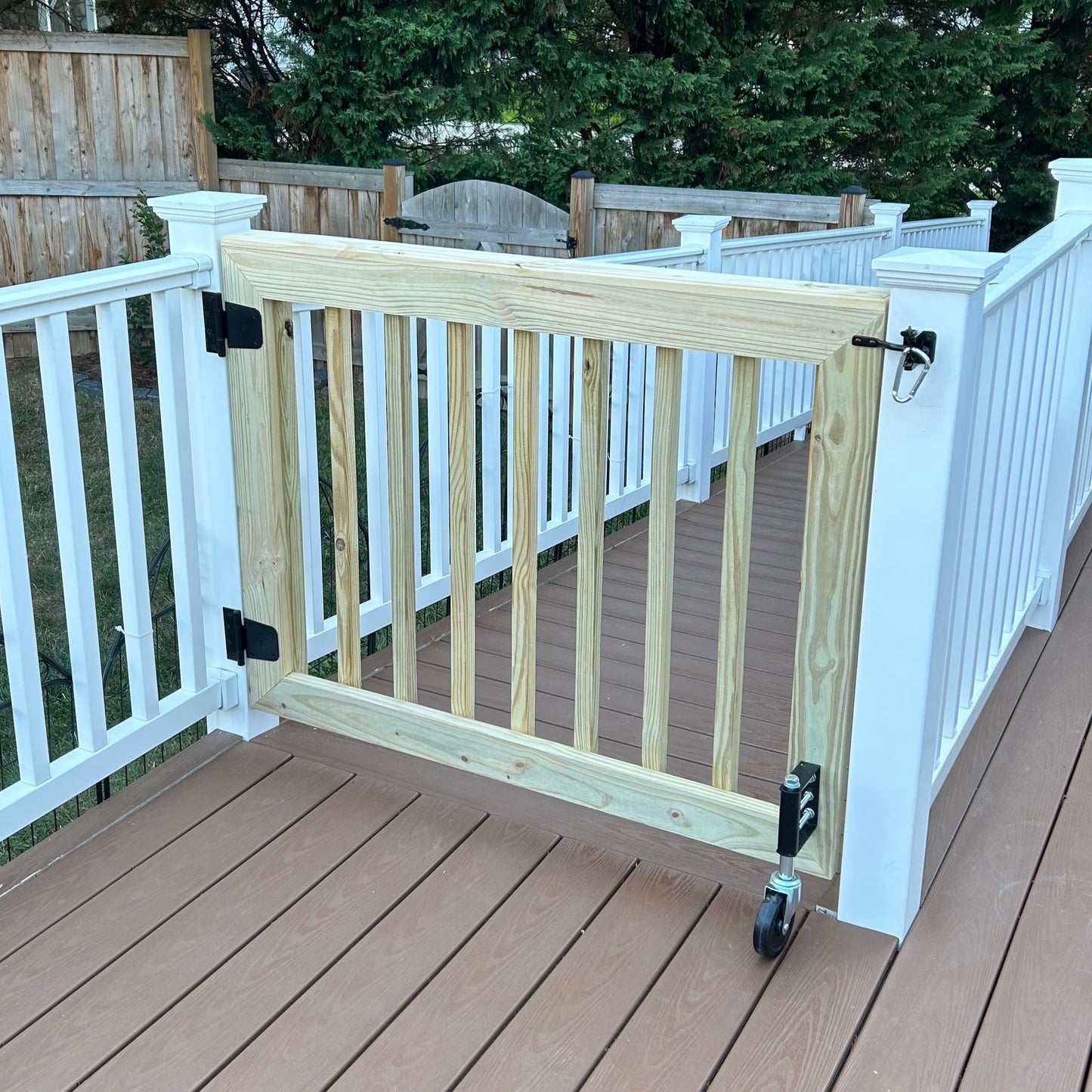 Custom wooden deck gate with balusters for patios and outdoor safety