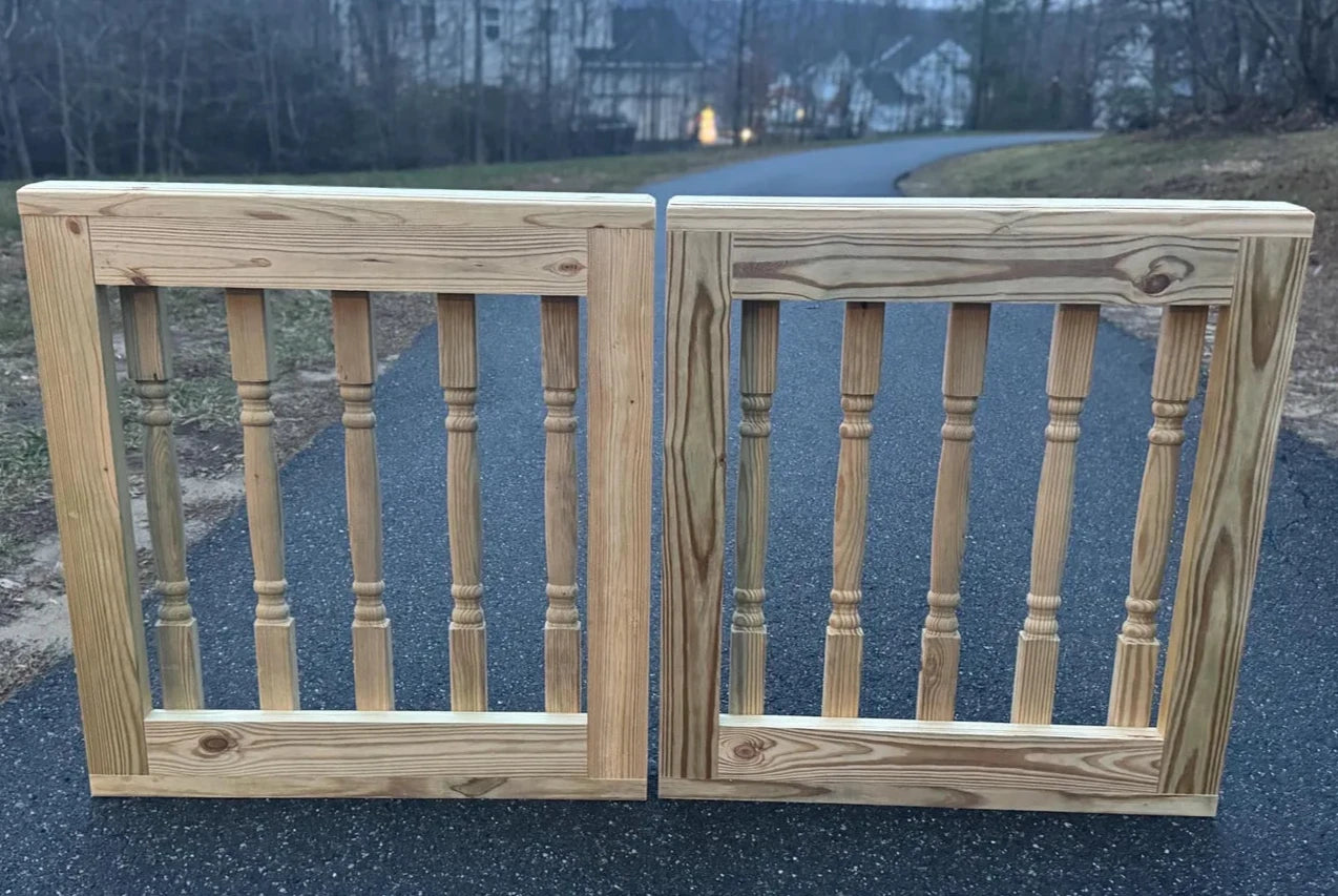 Rear view of a double decorative wooden baluster gate, displaying the structural integrity and design consistency from all angles.