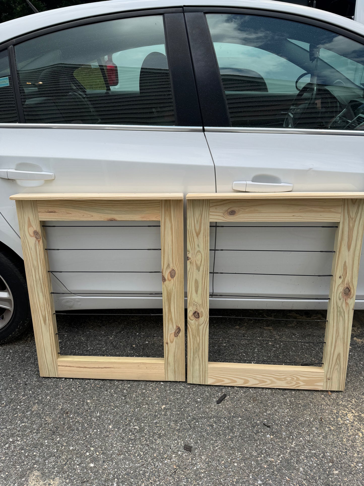Custom double pressure-treated wood patio gate with horizontal stainless steel cable railing