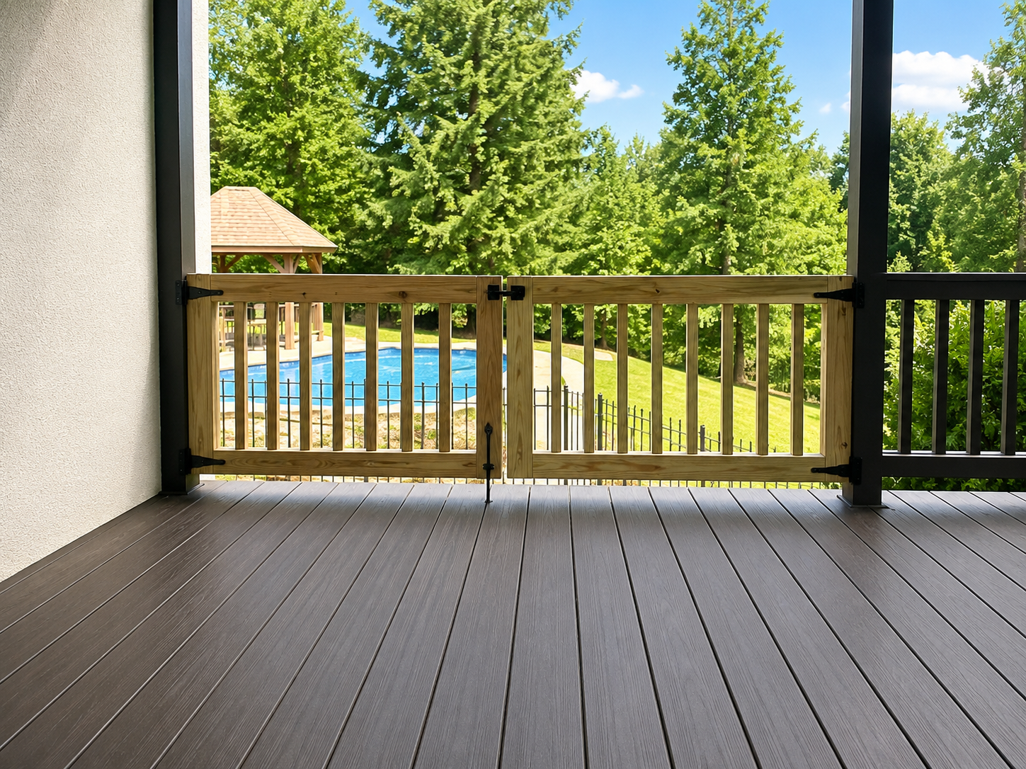 Custom wooden double deck gate overlooking pool area | Oak Street Gates
