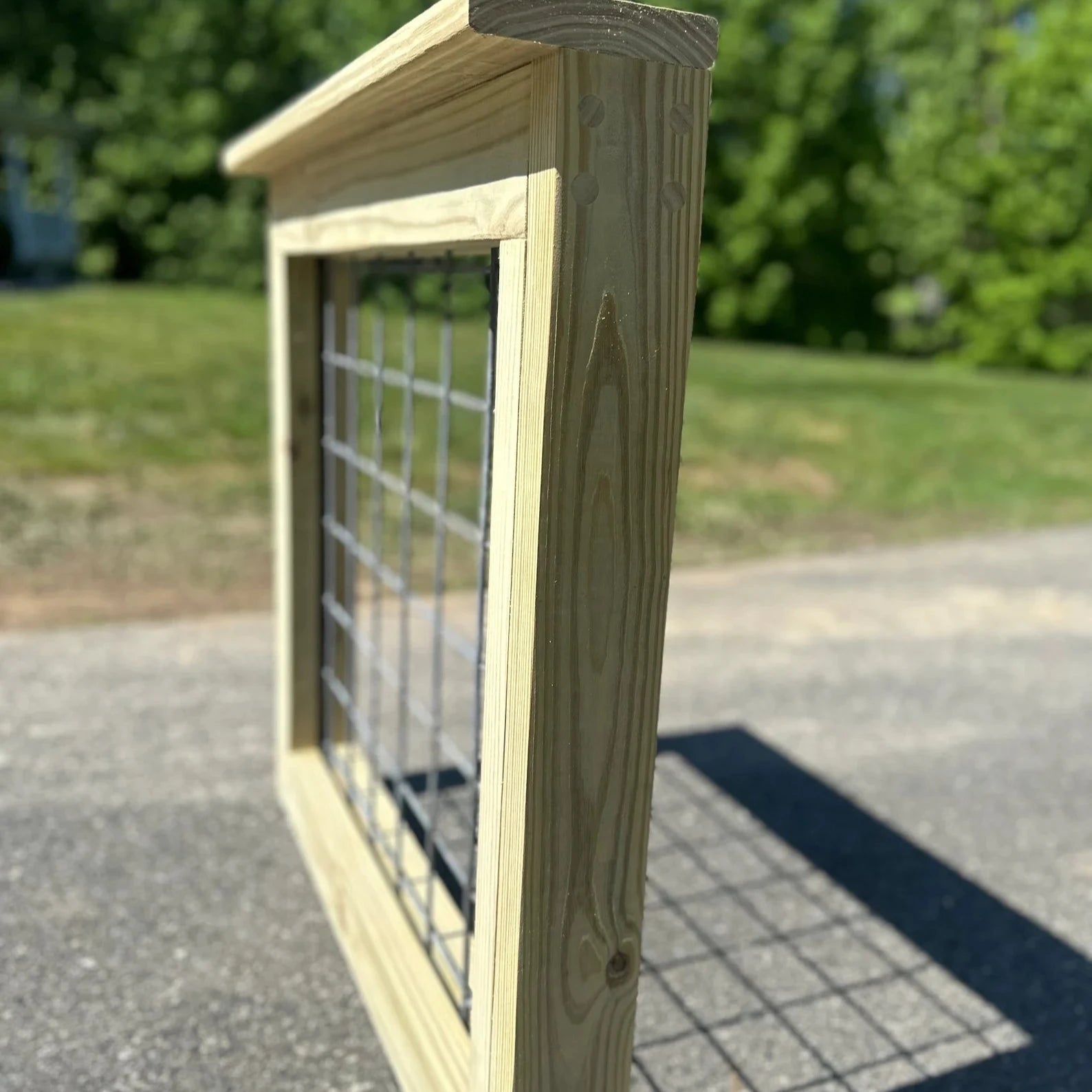Side view of a custom Hog Wire Patio Gate – Built with pressure-treated lumber and hog wire mesh for a secure and stylish solution for outdoor spaces.
